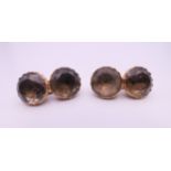 A pair of early 19th century unmarked cufflinks. 1.25 cm diameter. 7.8 grammes total weight.