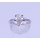 An 18 ct white gold pear shaped single stone diamond ring. Approximate diamond weight 1.02 carats.