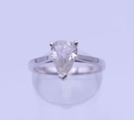 An 18 ct white gold pear shaped single stone diamond ring. Approximate diamond weight 1.02 carats.
