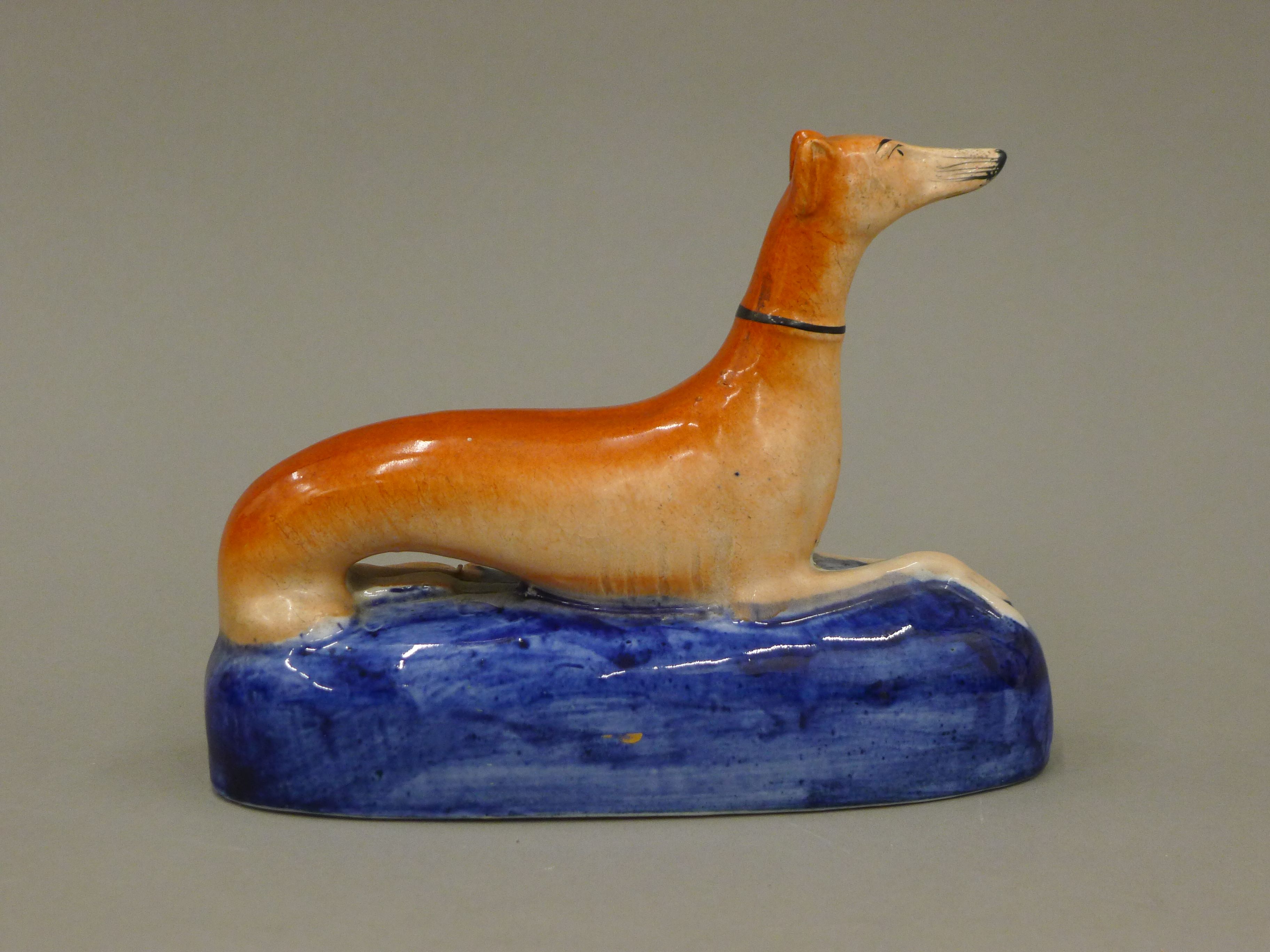 A pair of 19th century Staffordshire pottery models of coursing greyhounds, - Image 3 of 7