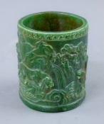 A Chinese carved brush pot. 11.5 cm high.