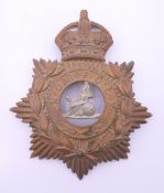 A vintage Norfolk cap badge. 13 cm high.