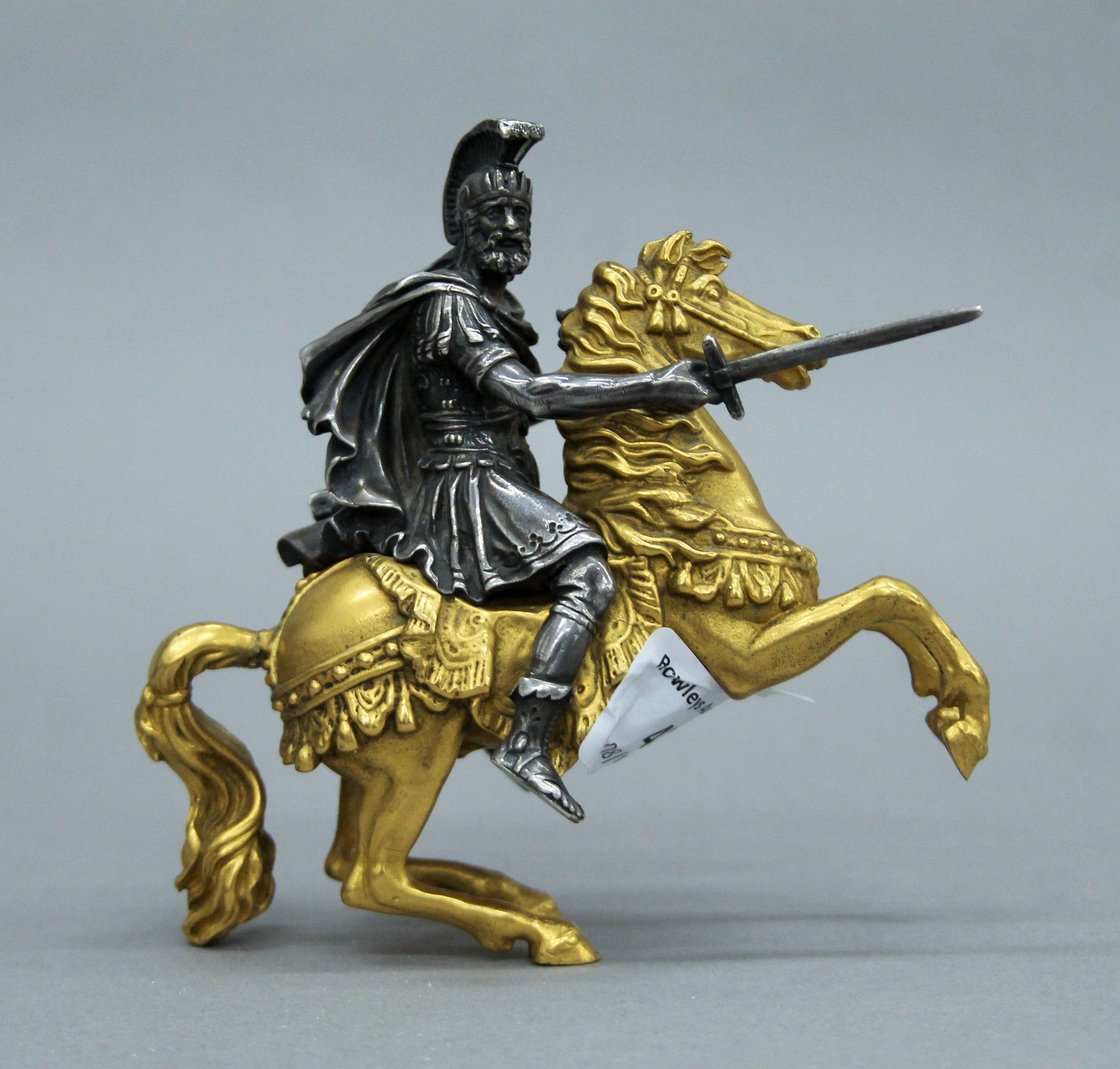 A 19th century gilt and silvered bronze model of a warrior on horseback. 11 cm high. - Image 2 of 4