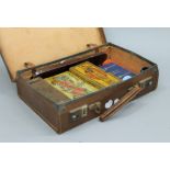 A small case containing various vintage games.