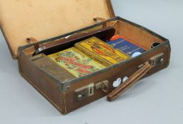 A small case containing various vintage games.