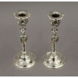 A pair of silver plated candlestick formed as jockeys. 19.5 cm high.