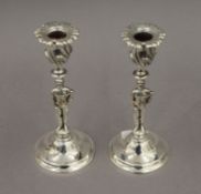 A pair of silver plated candlestick formed as jockeys. 19.5 cm high.