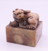 A small dog-of-fo soapstone seal. 4 cm high.