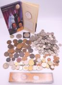 A collection of coins, including sixpences, pennies, farthings, half pennies, etc.