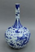 A large Chinese blue and white porcelain bottle vase. 35 cm high.