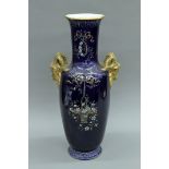 A Longchamp porcelain vase. 60 cm high.