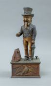 A cast iron Uncle Sam money box. 28 cm high.