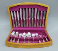 A canteen of silver plated cutlery. 44 cm wide.
