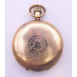 A Waltham gold plated full hunter pocket watch. 5 cm diameter.