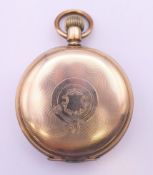 A Waltham gold plated full hunter pocket watch. 5 cm diameter.