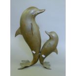 A brass model of two dolphins. 48 cm high.