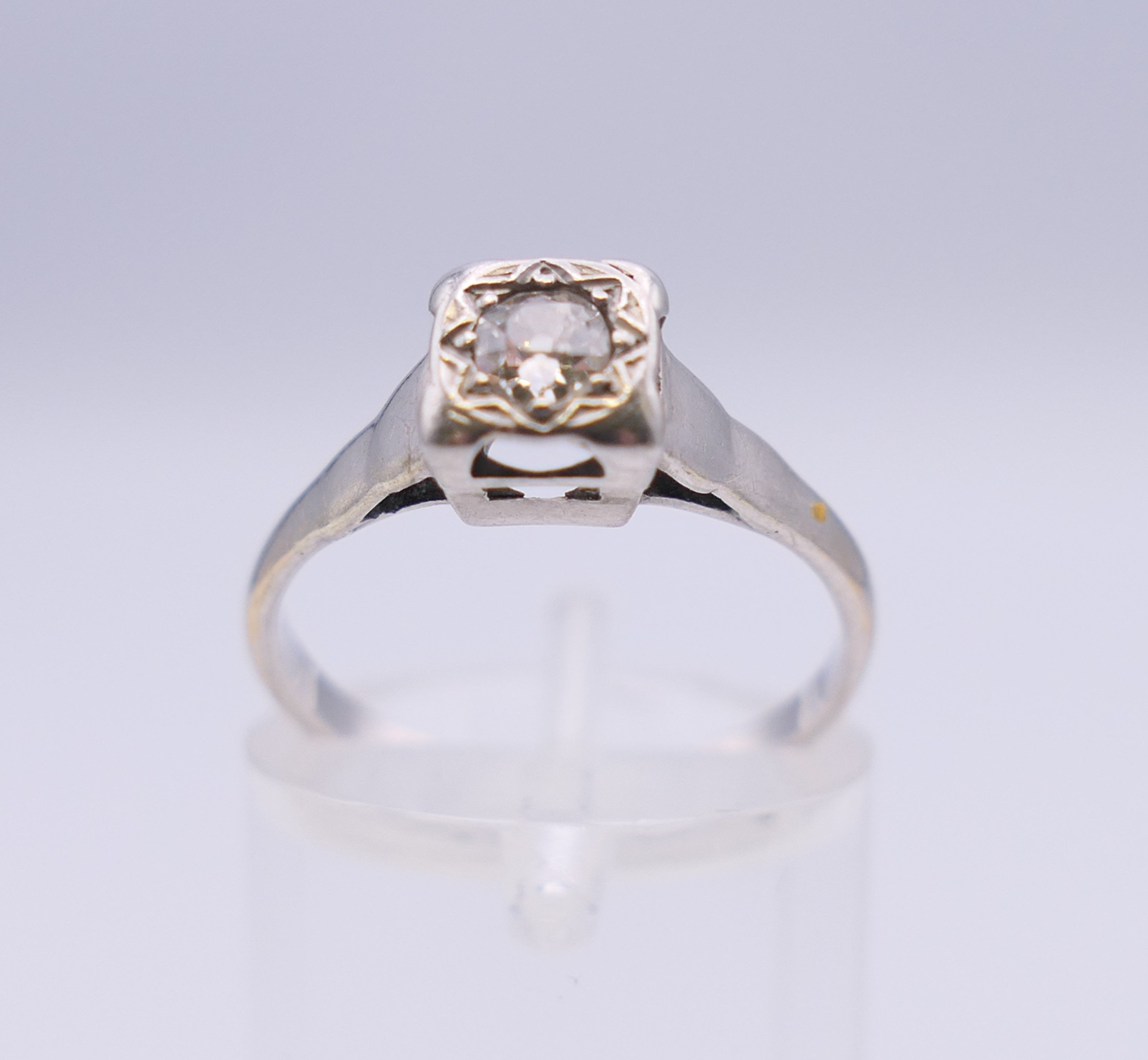 An 18 ct white gold and platinum illusion set diamond solitaire ring. Ring size L/M. 2. - Image 3 of 6