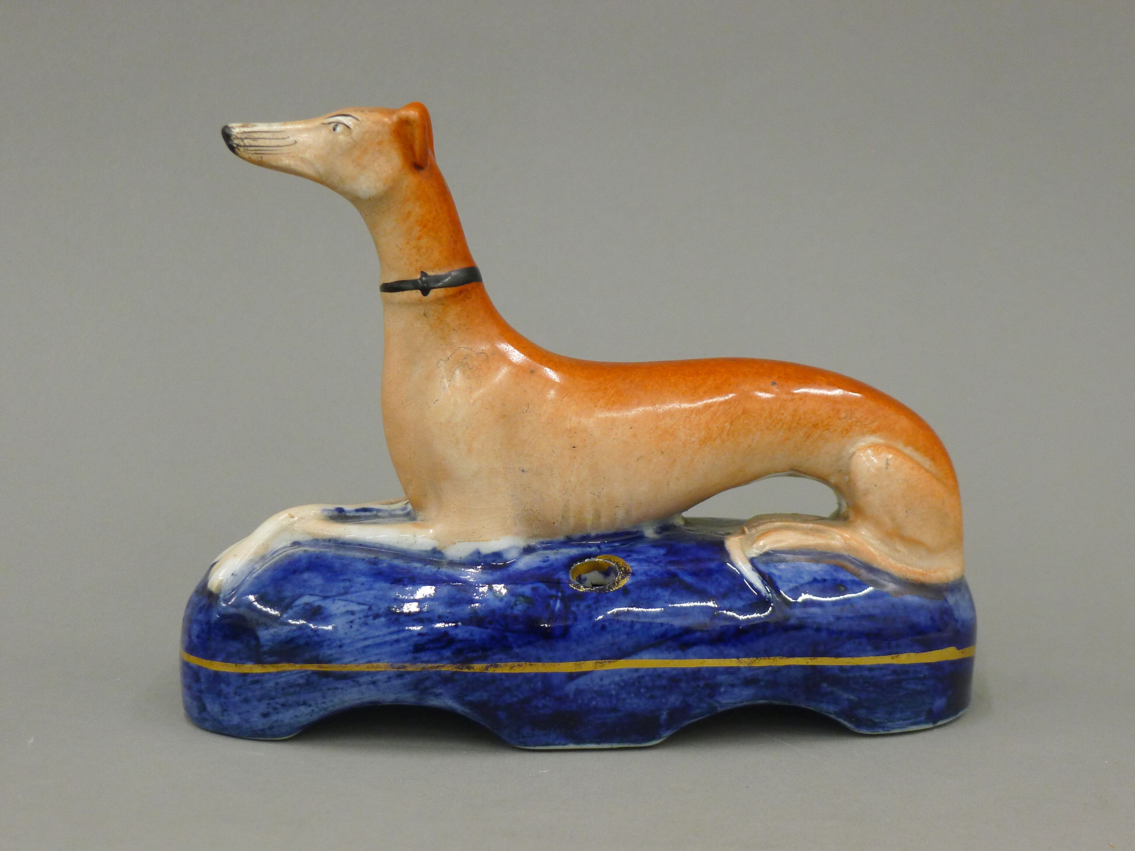 A pair of 19th century Staffordshire pottery models of coursing greyhounds, - Image 2 of 7