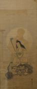 A Chinese scroll painting, decorated with Guanyin holding a ruyi sceptre seated on a dragon,
