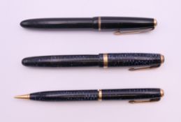 A Parker Blue Diamond fountain pen and propelling pencil, and another Parker Fountain pen.
