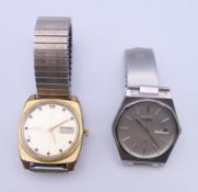 Two gentlemen's Seiko wristwatches. Each approximately 3.5 cm wide.