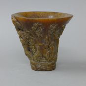 A libation cup. 13.5 cm high.