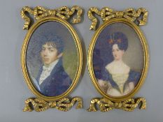 A pair of gilt framed miniatures. 23.5 cm high overall.