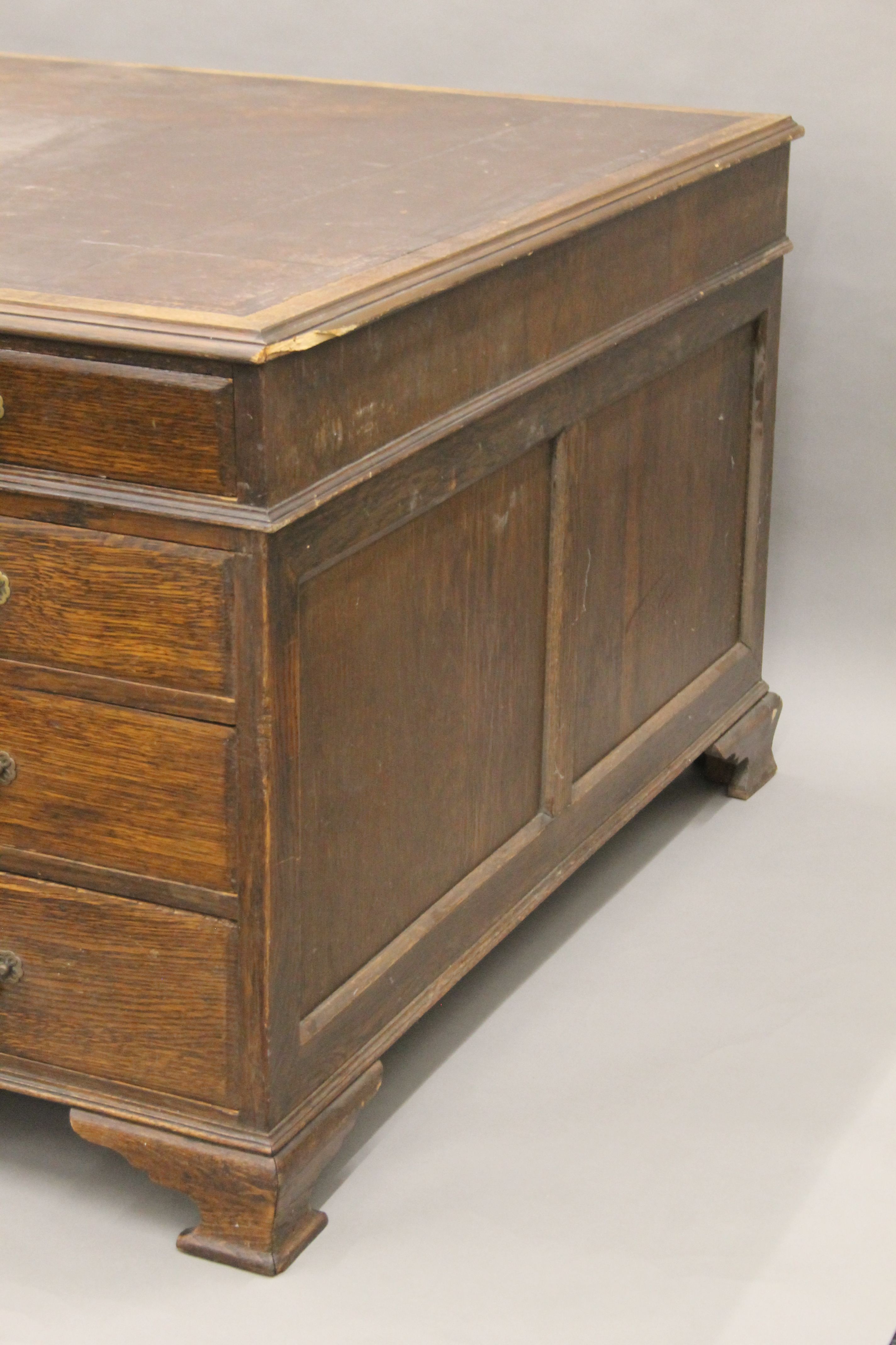An early 20th century oak partner's desk. 182 x 123 cm. - Image 4 of 8
