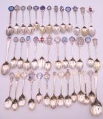 A quantity of silver teaspoons, mostly Masonic. 21.8 troy ounces total weight.