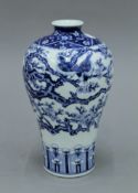 A Chinese blue and white porcelain vase, the underside with blue painted six character mark. 21.