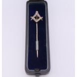 A Victorian Masonic rose cut diamond stick pin, boxed. 1.5 cm wide.