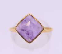 A silver gilt amethyst ring. Ring size N.