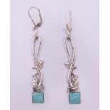 A pair of silver dress earrings. 5.75 cm high.