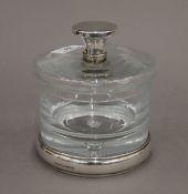 A silver mounted glass jar. 13 cm high.