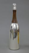 A silver plate champagne bottle formed cocktail shaker. 38 cm high.