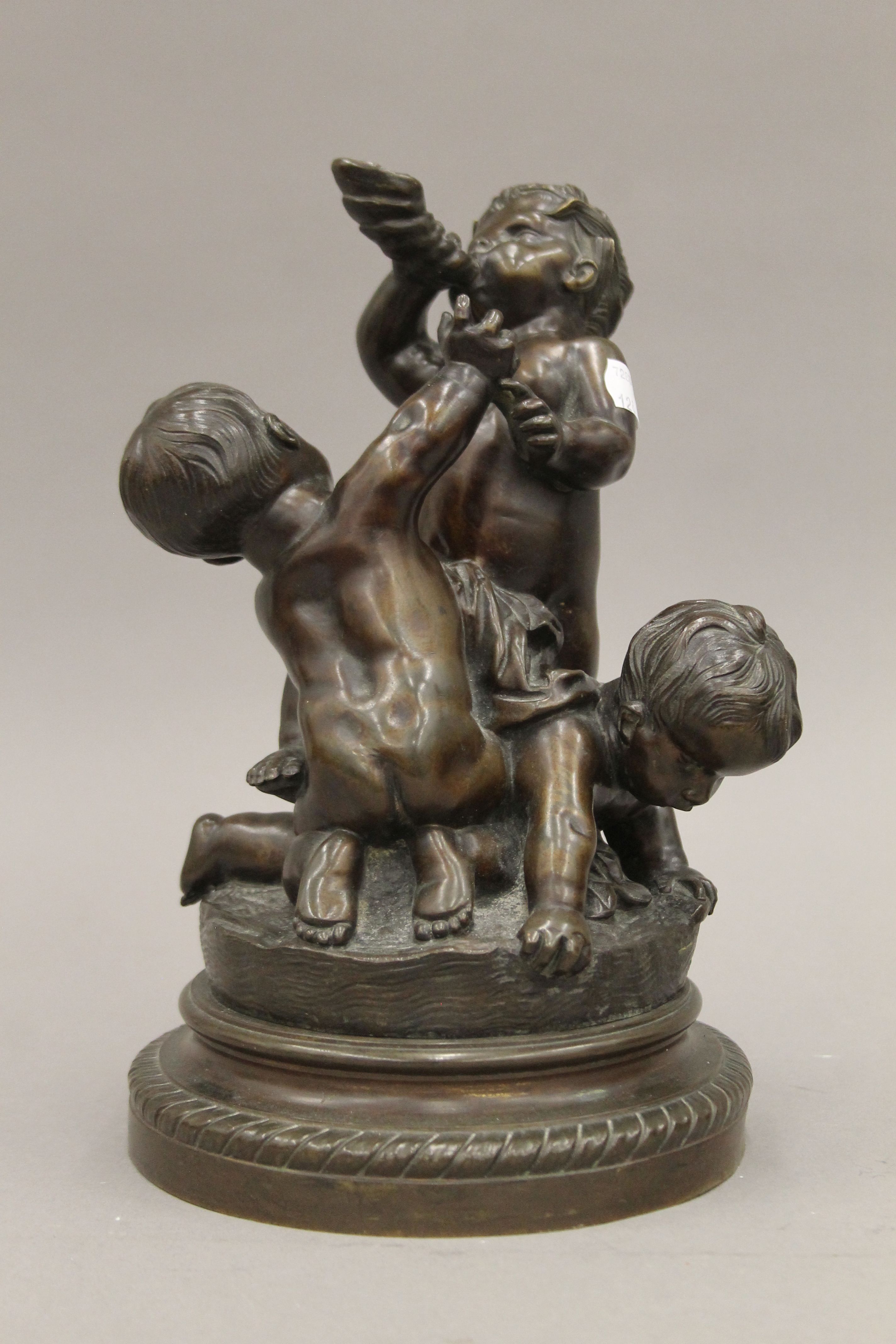A pair of 19th century bronze sculptures of putti. Each approximately 28 cm high. - Image 2 of 5