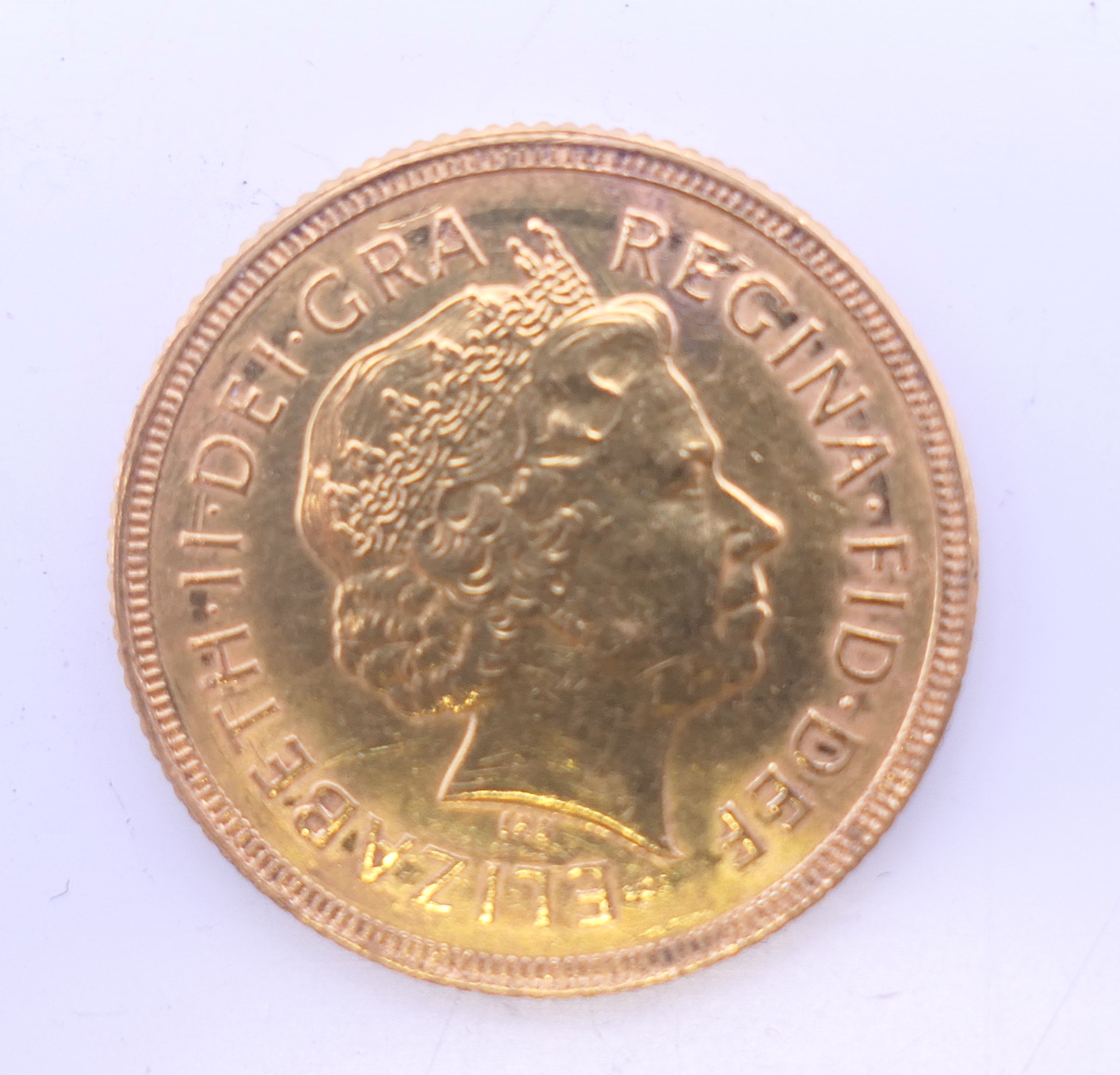 A 2000 gold sovereign.