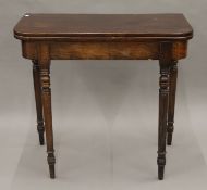A 19th century mahogany fold over tea table. 81 cm wide.