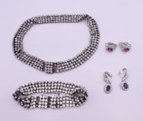 A quantity of various costume jewellery, including matching necklace and bracelet.