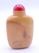 A Chinese hardstone snuff bottle and stopper. 6 cm high.