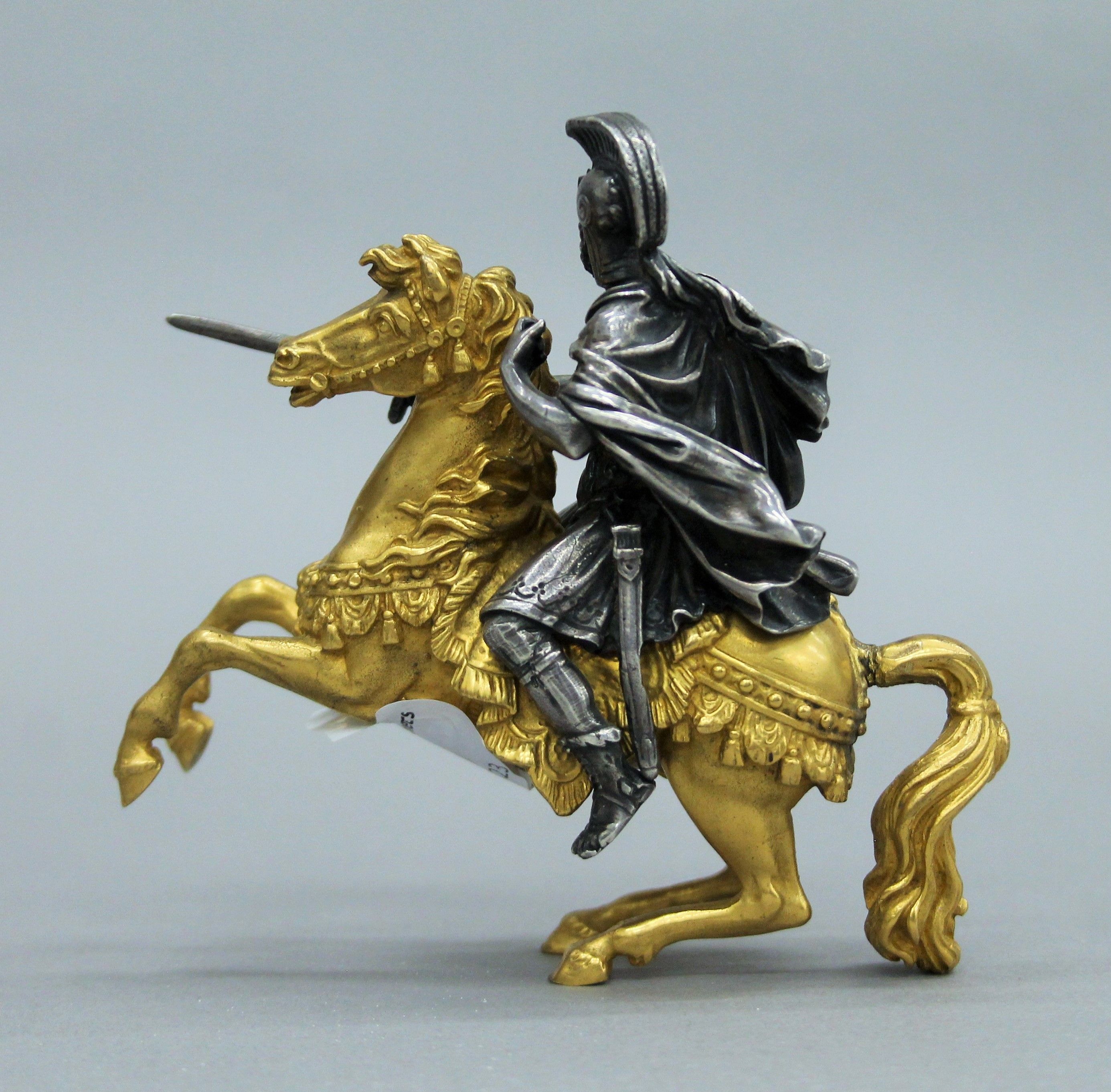 A 19th century gilt and silvered bronze model of a warrior on horseback. 11 cm high. - Image 4 of 4