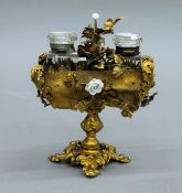 A Palais Royale gilded inkwell. 18 cm high.