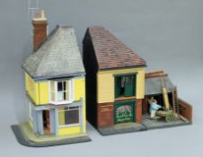 Three shop dioramas. The largest 51 cm high.