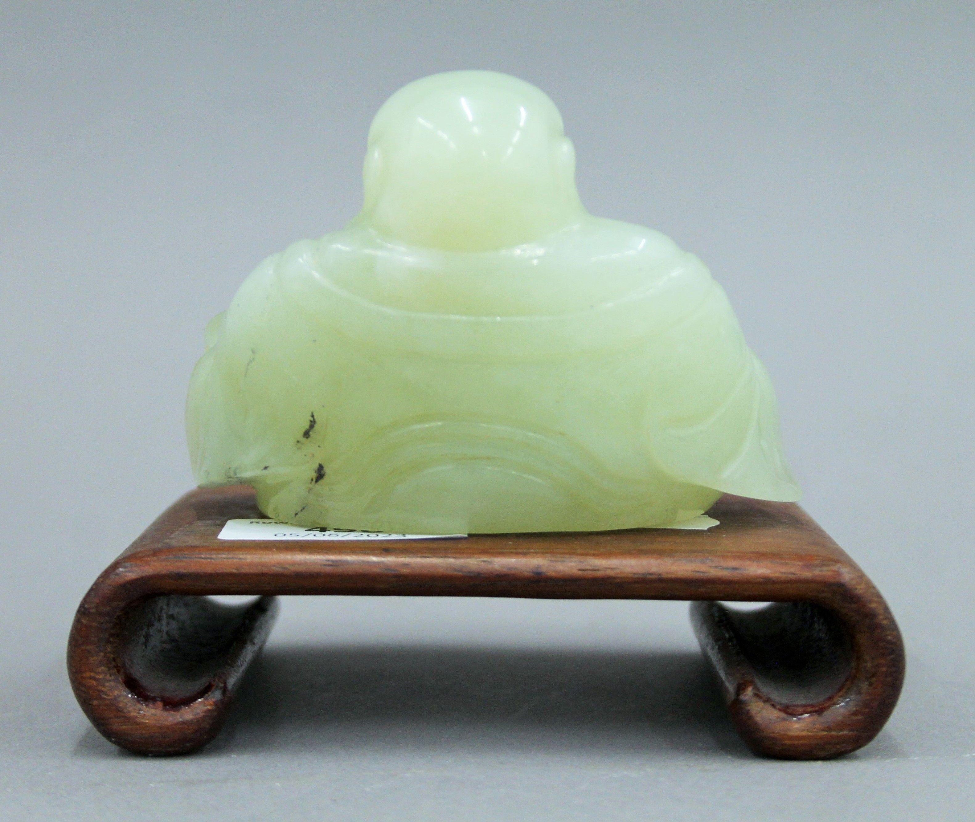 A Chinese model of Buddha on a wooden stand. 10 cm high overall. - Image 5 of 5
