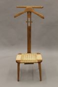 A valet stand/chair. 109 cm high.