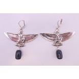 A pair of sterling silver Egyptian revival earrings. 5 cm wide.