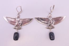 A pair of sterling silver Egyptian revival earrings. 5 cm wide.