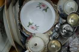 A box of various decorative porcelain.
