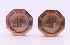 A pair of Audermars Piguet cufflinks. 2 cm diameter.