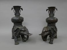 A pair of Chinese bronze censers formed as elephant. 41.5 cm high.